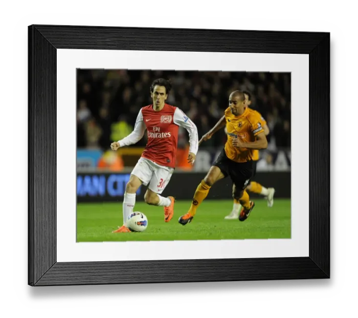 Framed Print : Intense Rivalry: Yossi Benayoun vs. Carl Henry - Arsenal vs. Wolverhampton Wanderers, Premier League, 2011-12: A Battle on the Field Framed Print : Intense Rivalry: Yossi Benayoun vs. Carl Henry - Arsenal vs. Wolverhampton Wanderers, Premier League, 2011-12: A Battle on the Field