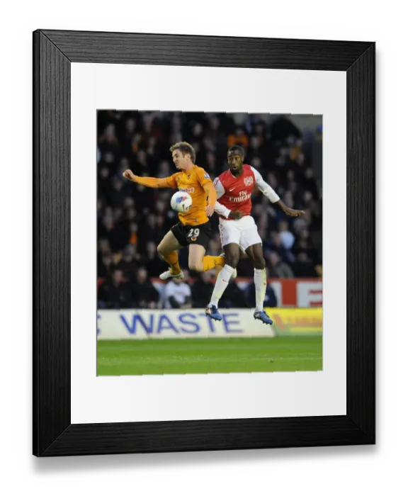 Framed Print : Clash at Molineux: Djourou vs. Doyle - Wolverhampton Wanderers vs. Arsenal, Premier League, 2012 Framed Print : Clash at Molineux: Djourou vs. Doyle - Wolverhampton Wanderers vs. Arsenal, Premier League, 2012