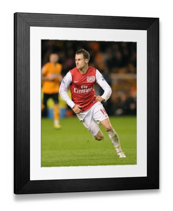 Framed Print : Aaron Ramsey in Action: Wolverhampton Wanderers vs Arsenal, Premier League 2011-12