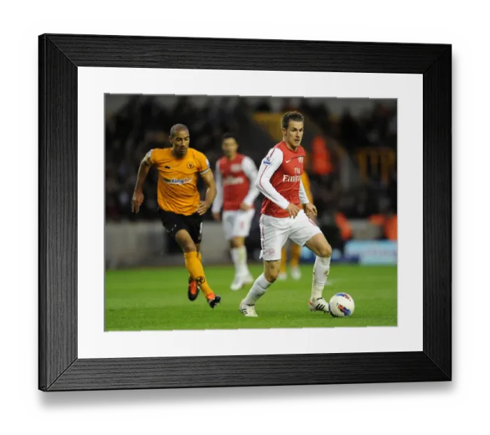 Framed Print : Aaron Ramsey (Arsenal) Carl Henry (Wolves). Wolverhampton Wanderers 0: 3 Arsenal Framed Print : Aaron Ramsey (Arsenal) Carl Henry (Wolves). Wolverhampton Wanderers 0: 3 Arsenal