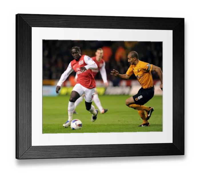 Framed Print : Bacary Sagna Outmaneuvers Carl Henry: Wolverhampton Wanderers vs. Arsenal, Premier League, 2012
