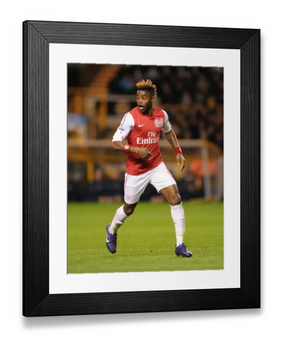 Framed Print : Alex Song in Action: Wolverhampton Wanderers vs. Arsenal, Premier League 2011-12 Framed Print : Alex Song in Action: Wolverhampton Wanderers vs. Arsenal, Premier League 2011-12