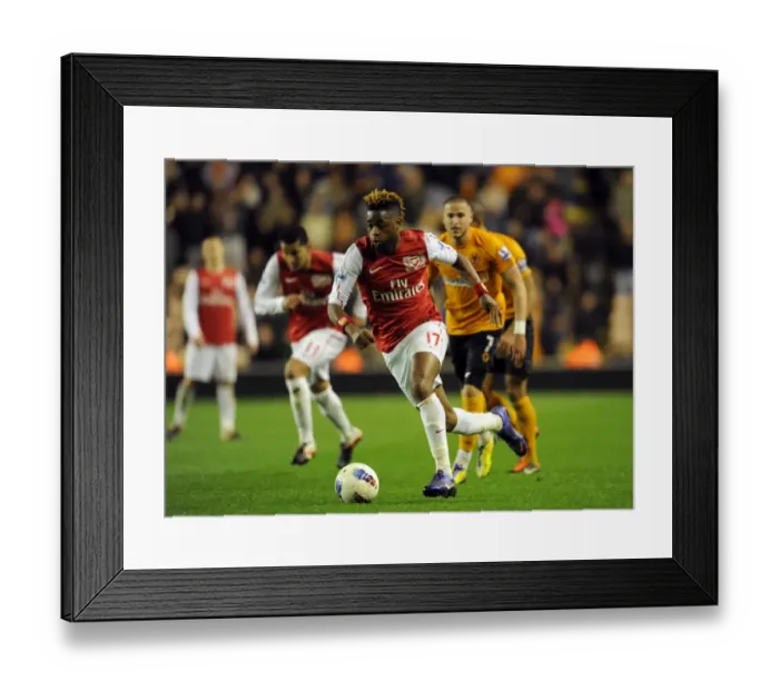 Framed Print : Alex Song: In Action for Arsenal Against Wolverhampton Wanderers, Premier League 2011-12
