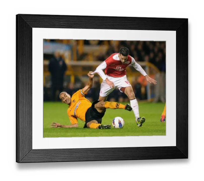 Framed Print : Van Persie vs. Henry: Intense Clash in Arsenal's Win Against Wolverhampton Wanderers (2012) Framed Print : Van Persie vs. Henry: Intense Clash in Arsenal's Win Against Wolverhampton Wanderers (2012)