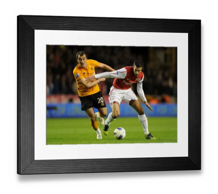 Framed Print : Robin van Persie vs. Nenad Milijas: A Battle at Molineux, Arsenal vs. Wolverhampton Wanderers, Premier League 2011-2012 Framed Print : Robin van Persie vs. Nenad Milijas: A Battle at Molineux, Arsenal vs. Wolverhampton Wanderers, Premier League 2011-2012