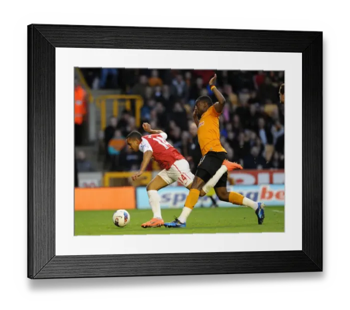 Framed Print : Theo Walcott vs. Sebastien Bassong: A Penalty Showdown Deciding Arsenal's Victory (2011-12) Framed Print : Theo Walcott vs. Sebastien Bassong: A Penalty Showdown Deciding Arsenal's Victory (2011-12)