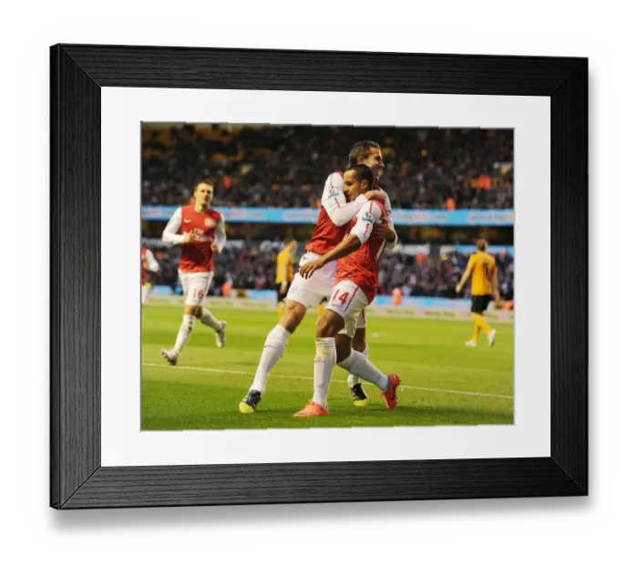 Framed Print : Arsenal's Unforgettable Victory: Walcott-van Persie's Dazzling Goal Celebration at Wolverhampton Wanderers, 2011-12 Premier League