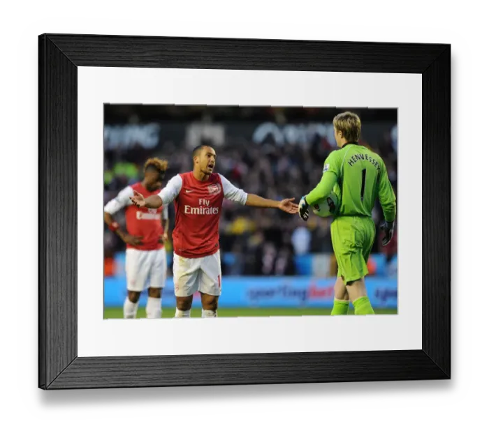 Framed Print : Theo Walcott's Conversation with Wayne Hennessey during Wolverhampton Wanderers vs. Arsenal (2011-12) Framed Print : Theo Walcott's Conversation with Wayne Hennessey during Wolverhampton Wanderers vs. Arsenal (2011-12)