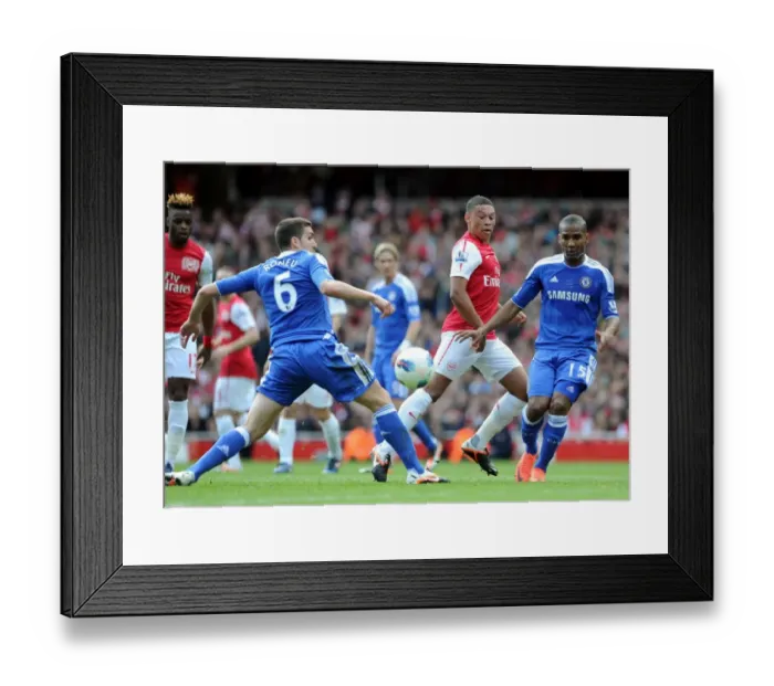 Framed Print : Arsenal's Oxlade-Chamberlain Outmaneuvers Chelsea's Romeu and Malouda Framed Print : Arsenal's Oxlade-Chamberlain Outmaneuvers Chelsea's Romeu and Malouda