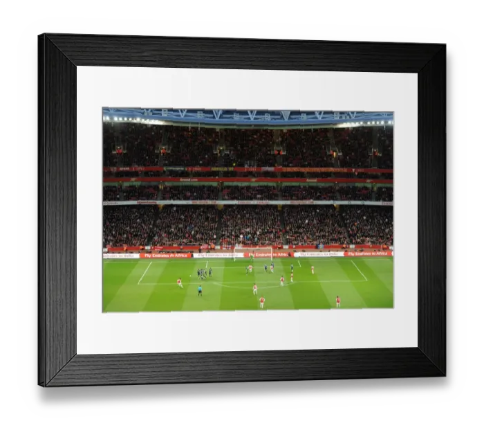 Framed Print : Arsenal vs Wigan Athletic: The Electric Atmosphere of the North Bank (April 2012) Framed Print : Arsenal vs Wigan Athletic: The Electric Atmosphere of the North Bank (April 2012)