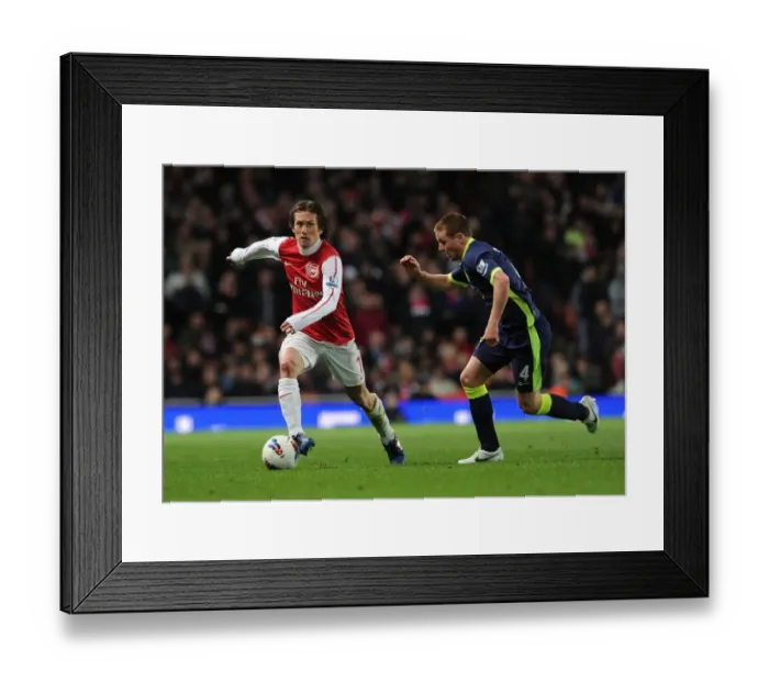 Framed Print : Arsenal's Rosicky Outmaneuvers Wigan's McCarthy in 2011-12 Premier League Clash Framed Print : Arsenal's Rosicky Outmaneuvers Wigan's McCarthy in 2011-12 Premier League Clash