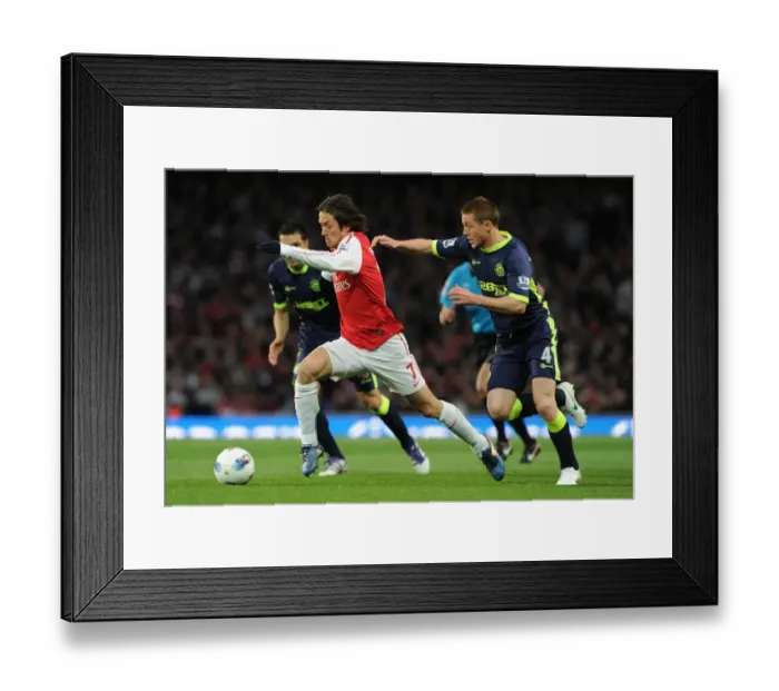 Framed Print : Arsenal's Tomas Rosicky Outmaneuvers Wigan's James McCarthy