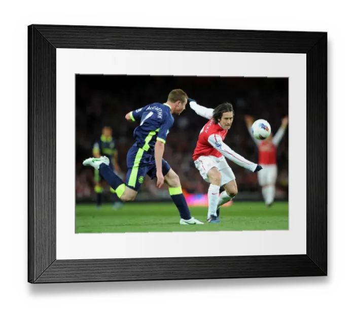 Framed Print : Arsenal's Rosicky Outwits Wigan's McCarthy: A Battle of Midfield Maestros in the Premier League Framed Print : Arsenal's Rosicky Outwits Wigan's McCarthy: A Battle of Midfield Maestros in the Premier League