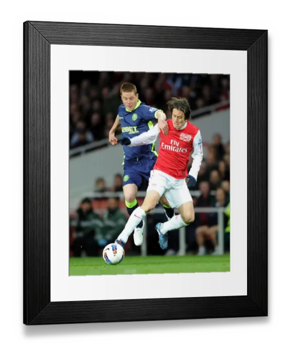 Framed Print : Rosicky vs. McCarthy: A Premier League Clash at Emirates Stadium