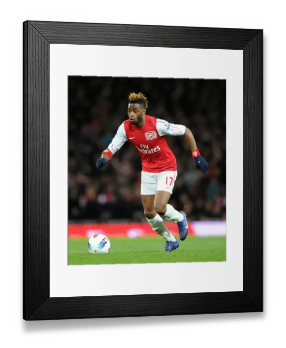 Framed Print : Alex Song (Arsenal). Arsenal 1: 2 Wigan Athletic. Barclays Premier League Framed Print : Alex Song (Arsenal). Arsenal 1: 2 Wigan Athletic. Barclays Premier League