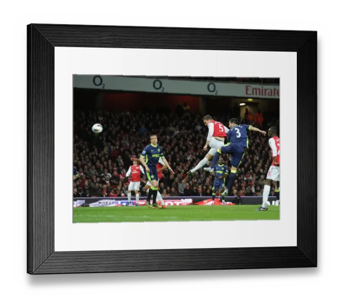 Framed Print : Thomas Vermaelen Leaps Past Antolin Alcaraz to Score for Arsenal Against Wigan Athletic, April 2012 Framed Print : Thomas Vermaelen Leaps Past Antolin Alcaraz to Score for Arsenal Against Wigan Athletic, April 2012
