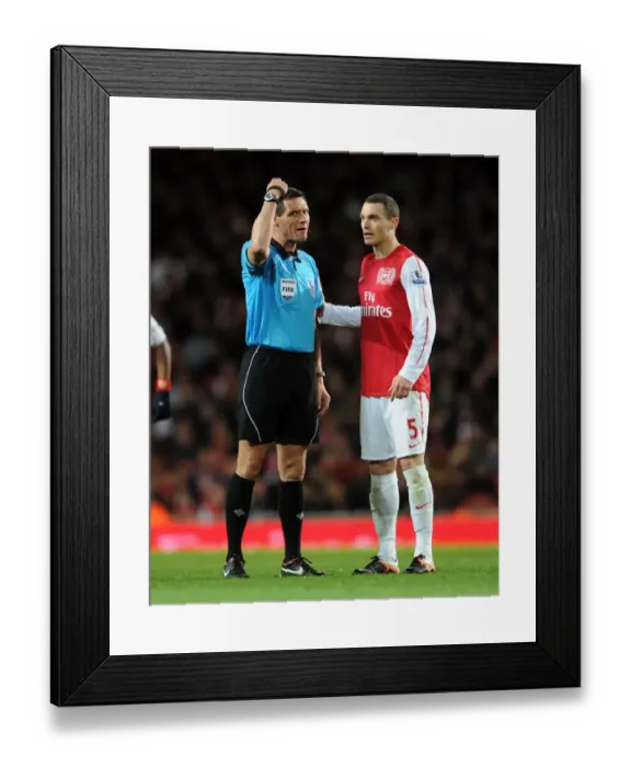 Framed Print : Thomas Vermaelen vs. Andre Marriner: A Clash at the Emirates