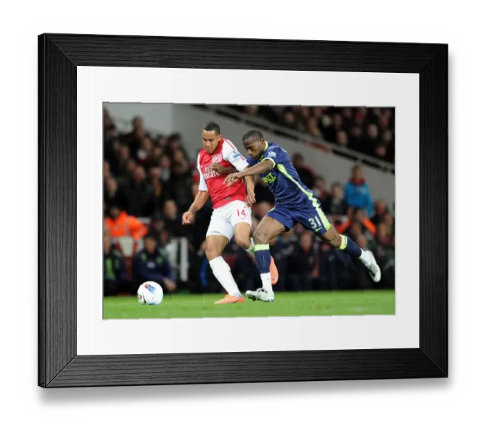 Framed Print : Theo Walcott vs. Maynor Figueroa: A Fight for Control at Emirates Stadium - Arsenal vs. Wigan Athletic (2012) Framed Print : Theo Walcott vs. Maynor Figueroa: A Fight for Control at Emirates Stadium - Arsenal vs. Wigan Athletic (2012)