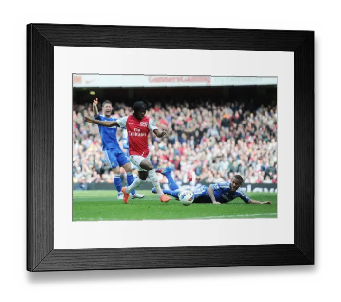 Framed Print : Arsenal vs. Chelsea: Intense Rivalry - Gervinho Fouls Bosingwa (2011-12)