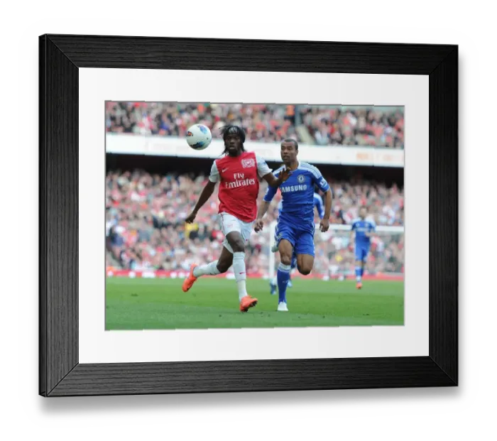 Framed Print : Gervinho vs. Ashley Cole: Intense Rivalry at the Emirates - Arsenal vs. Chelsea, Premier League 2011-12