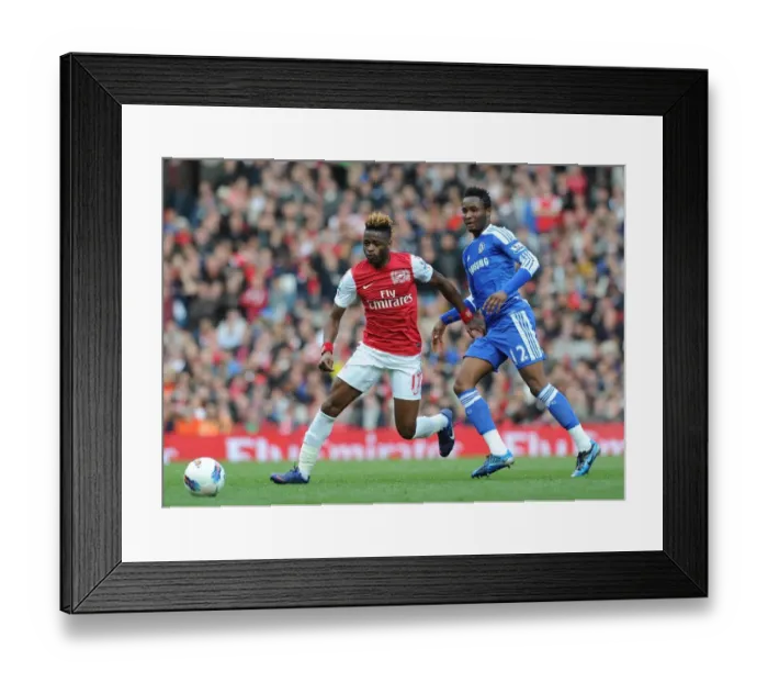 Framed Print : Arsenal's Alex Song Outmaneuvers Chelsea's John Obi Mikel