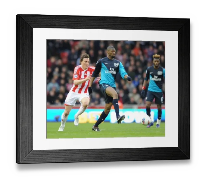 Framed Print : Abou Diaby Outmaneuvers Dean Whitehead: A Pivotal Moment from the 2011-12 Stoke City vs. Arsenal Match Framed Print : Abou Diaby Outmaneuvers Dean Whitehead: A Pivotal Moment from the 2011-12 Stoke City vs. Arsenal Match