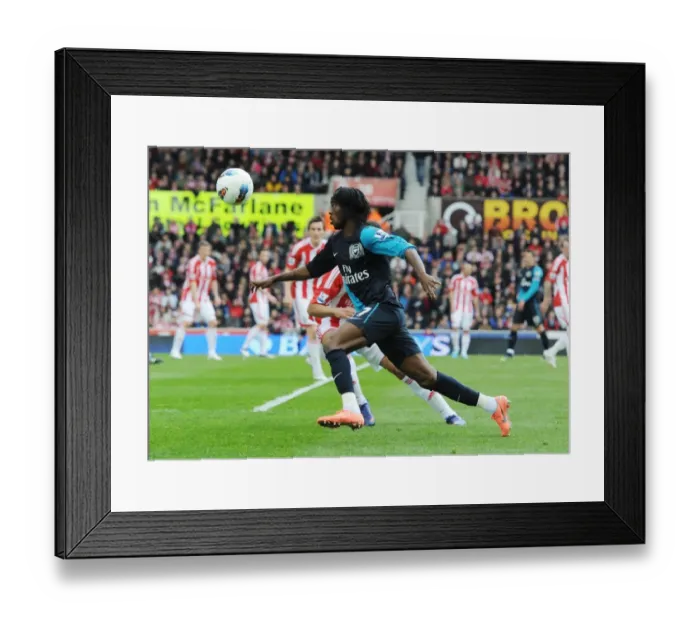 Framed Print : Gervinho in Action: Stoke City vs. Arsenal, Premier League 2011-12