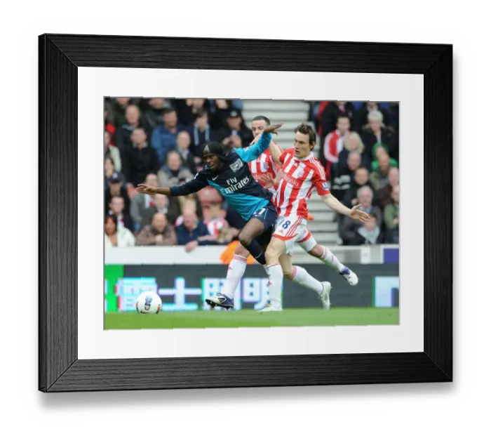Framed Print : Clash at Britannia: Gervinho vs. Stoke's Defense Framed Print : Clash at Britannia: Gervinho vs. Stoke's Defense