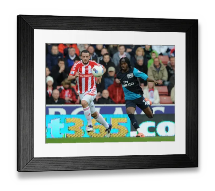 Framed Print : Gervinho Outmaneuvers Marc Wilson: A Pivotal Moment in Stoke vs. Arsenal (2011-12) Framed Print : Gervinho Outmaneuvers Marc Wilson: A Pivotal Moment in Stoke vs. Arsenal (2011-12)
