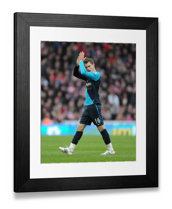 Framed Print : Aaron Ramsey in Action: Stoke City vs. Arsenal, Premier League 2011-12