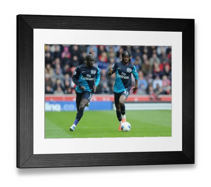 Framed Print : Sagna and Gervinho: A Moment from the Stoke City vs. Arsenal Premier League Clash (2011-12) Framed Print : Sagna and Gervinho: A Moment from the Stoke City vs. Arsenal Premier League Clash (2011-12)