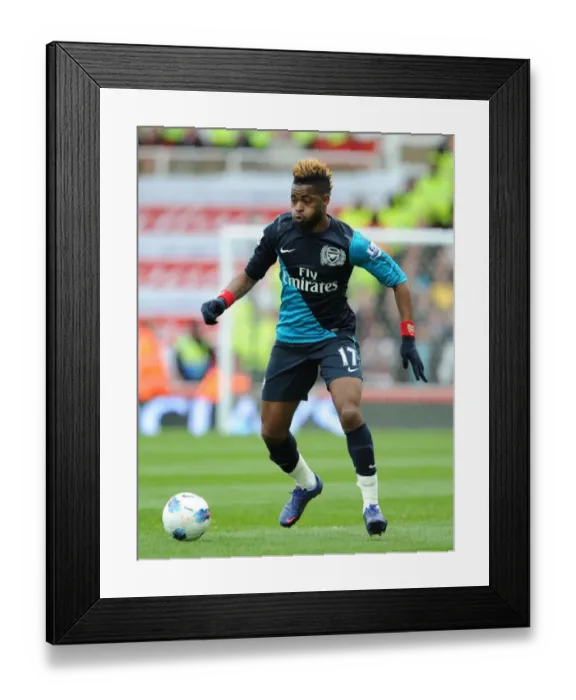Framed Print : Alex Song in Action: Stoke City vs Arsenal, Premier League 2011-12 Framed Print : Alex Song in Action: Stoke City vs Arsenal, Premier League 2011-12
