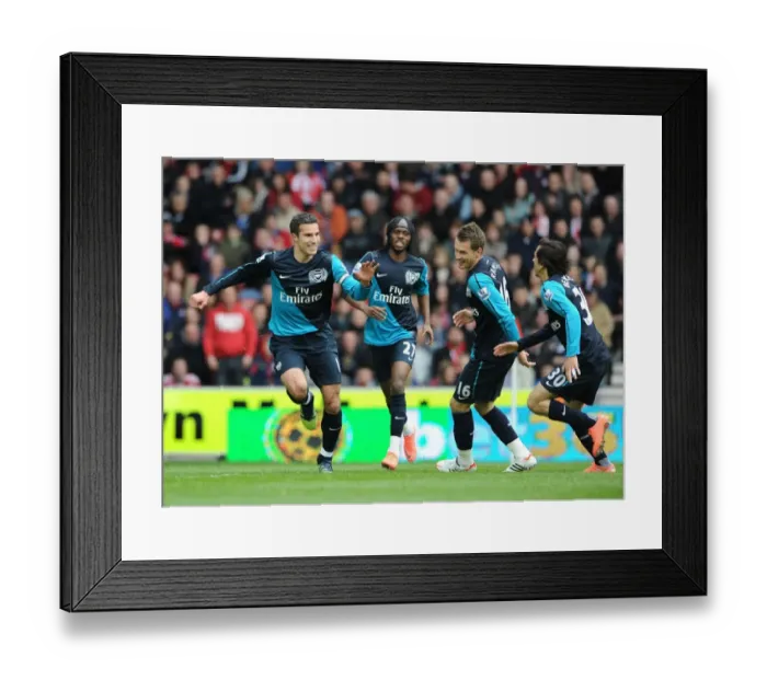 Framed Print : United in Victory: Van Persie, Gervinho, Ramsey, and Benayoun Celebrate Goal Against Stoke City Framed Print : United in Victory: Van Persie, Gervinho, Ramsey, and Benayoun Celebrate Goal Against Stoke City