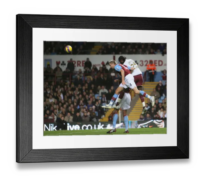 Framed Print : Emmanuel Adebayor beats Olof Mellberg to score the 2nd Arsenal goal Framed Print : Emmanuel Adebayor beats Olof Mellberg to score the 2nd Arsenal goal