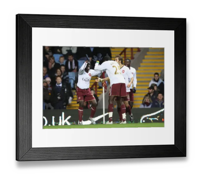 Framed Print : Adebayor and Eboue: Dynamic Duo Celebrates Arsenal's Victory over Aston Villa (2007)