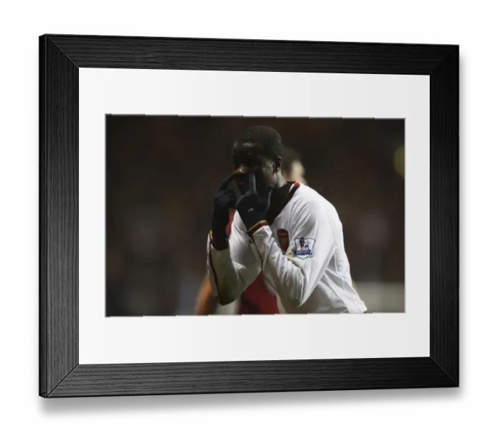 Framed Print : Emmanuel Eboue's Unforgettable Performance: Arsenal's 1-2 Victory Over Aston Villa (December 2007) Framed Print : Emmanuel Eboue's Unforgettable Performance: Arsenal's 1-2 Victory Over Aston Villa (December 2007)