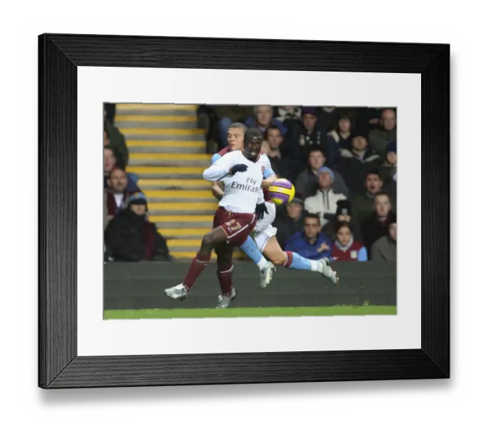 Framed Print : Emmanuel Eboue (Arsenal) Wilfred Bouma (Aston Villa) Framed Print : Emmanuel Eboue (Arsenal) Wilfred Bouma (Aston Villa)