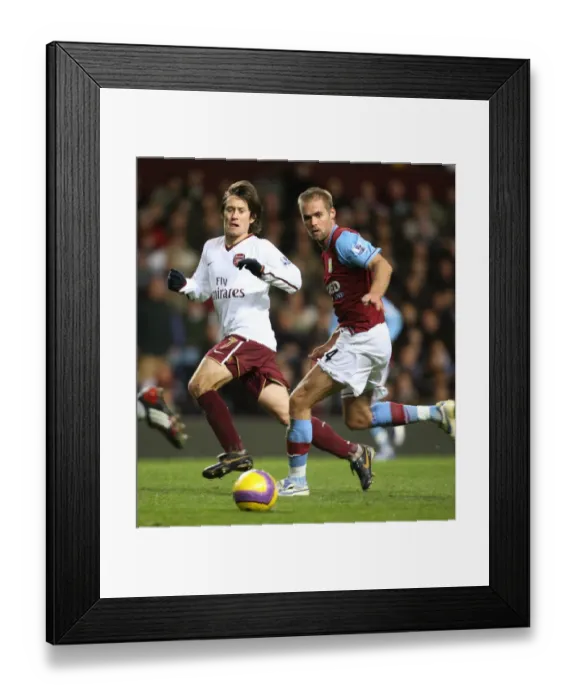 Framed Print : Tomas Rosicky (Arsenal) Olof Mellberg (Aston Villa) Framed Print : Tomas Rosicky (Arsenal) Olof Mellberg (Aston Villa)