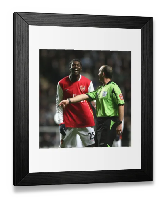 Framed Print : Emmanuel Adebayor (Arsenal) shares a joke with referee Mike Dean Framed Print : Emmanuel Adebayor (Arsenal) shares a joke with referee Mike Dean