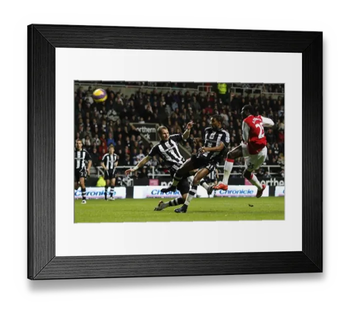 : Emmanuel Adebayor shoots past Shay Given to score the Arsenal goal : Emmanuel Adebayor shoots past Shay Given to score the Arsenal goal