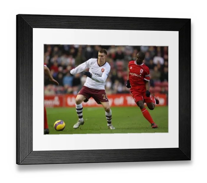 Framed Print : Nicklas Bendtner (Arsenal) George Boateng (Middlesbrough) Framed Print : Nicklas Bendtner (Arsenal) George Boateng (Middlesbrough)