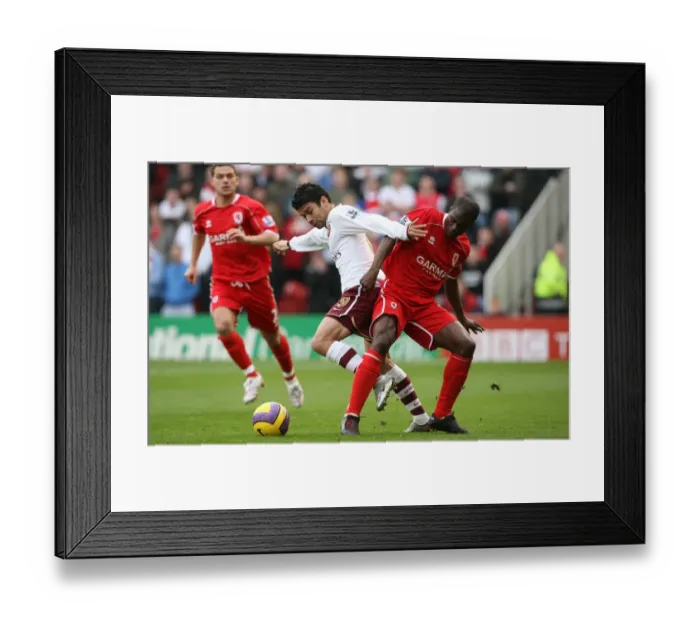 Framed Print : Eduardo vs. George Boateng: A Rivalry Unfolded - Middlesbrough's 2:1 Victory over Arsenal in the Barclays Premier League