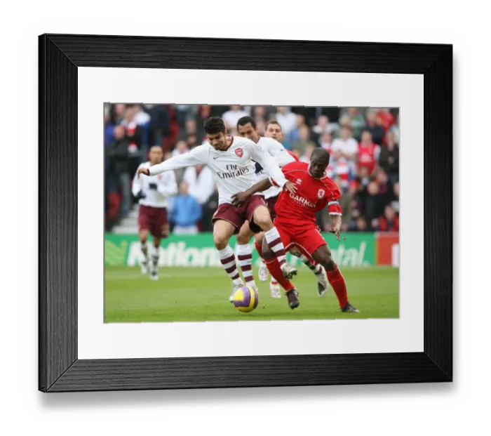 Framed Print : Eduardo vs. George Boateng: A Battle at Riverside Stadium - Middlesbrough Edge Past Arsenal 2:1 in Premier League Framed Print : Eduardo vs. George Boateng: A Battle at Riverside Stadium - Middlesbrough Edge Past Arsenal 2:1 in Premier League