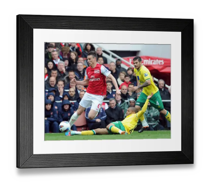 Framed Print : Arsenal's Koscielny Fouls by Norwich's Jackson in 2012 Premier League Clash