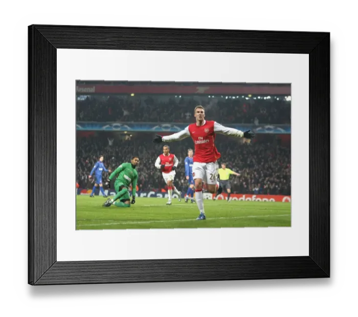 Framed Print : Bendtner's Brilliant Goal: Arsenal Takes 2-1 Lead Over Steaua Bucuresti in Champions League