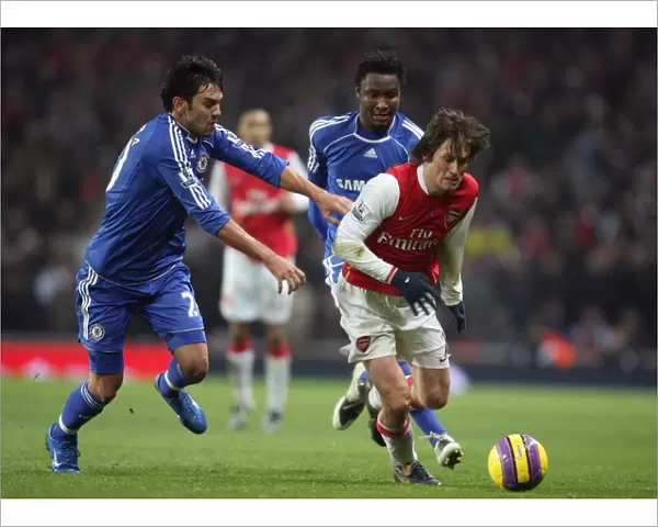 Tomas Rosicky (Arsenal) Paolo Ferreira and Jon Obi Mikel (Chelsea)
