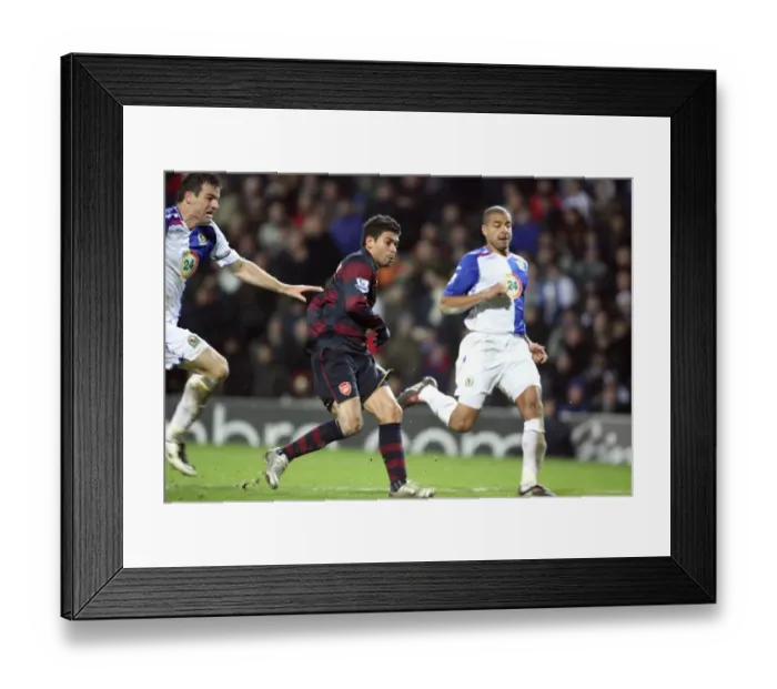 Framed Print : Eduardo scores Arsenals 3rd goal his 2nd under pressure from Steven Reid Framed Print : Eduardo scores Arsenals 3rd goal his 2nd under pressure from Steven Reid
