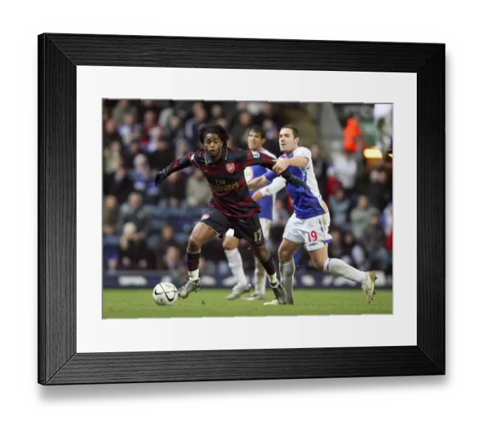 Framed Print : Alex Song (Arsenal) David Dunne (Blackburn) Framed Print : Alex Song (Arsenal) David Dunne (Blackburn)