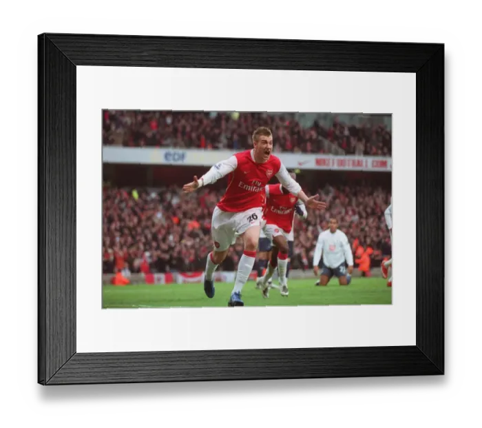 Framed Print : Bendtner's Brilliant Goal: Arsenal's 2-1 Victory Over Tottenham in the Premier League