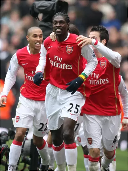 Emmanuel Adebayor celebrates scoring the 1st Arsenal goal with Cesc Fabregas
